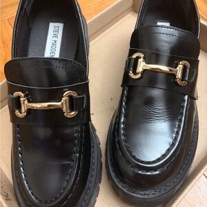 Steve Madden Glossy Black Loafers with Gold Detail